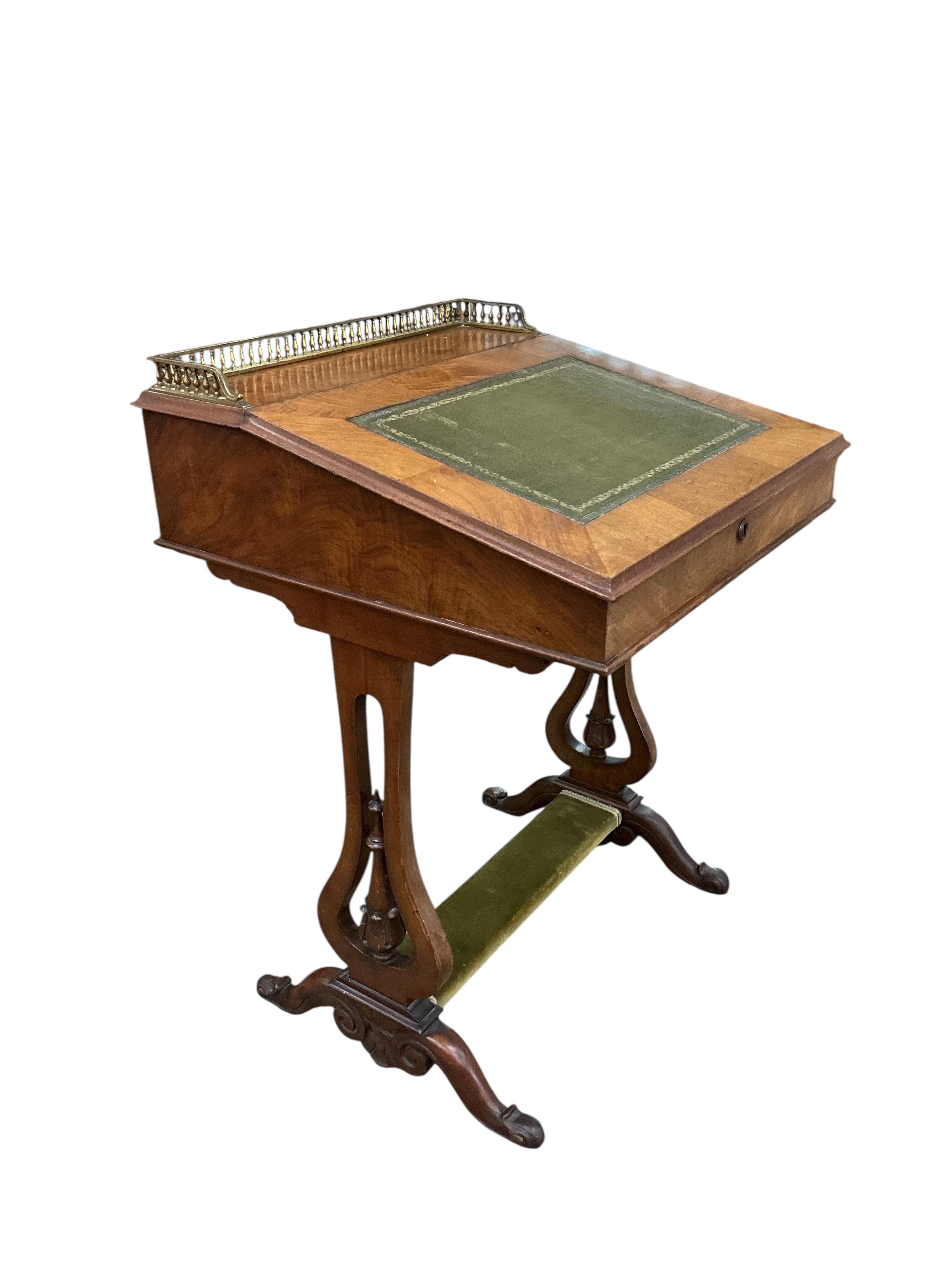 An early Victorian walnut Davenport, width 58cm, depth 59cm, height 82cm